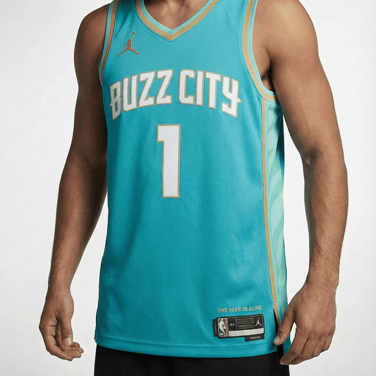 גופיית משחק רשמית שרלוט הורנטס תכלת זהב - TheFutbolistaCloset